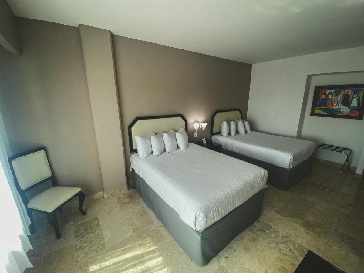 Gran Tuxtepec Plaza Hotel Bagian luar foto